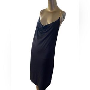 Plus 1X black jersey body con dress, low-cut front gold chain, crisscross straps